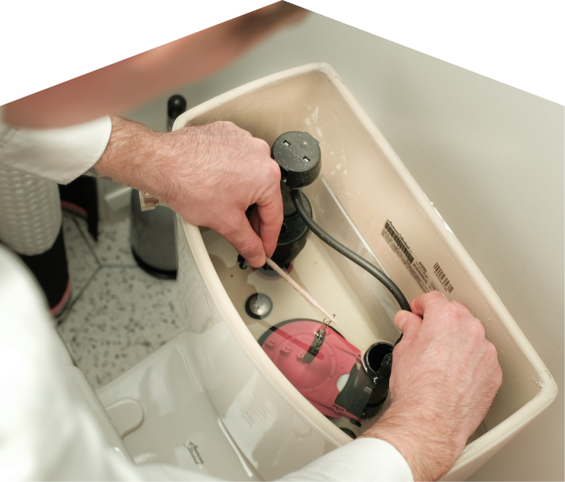 Limcan plumbing specialist adjusts internal components of a toilet tank, with tile flooring visible in the background. Limcan plumbing specialist adjusts internal components of a toilet tank, with tile flooring visible in the background.